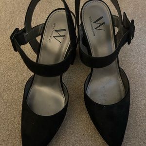 Woman’s black high heels